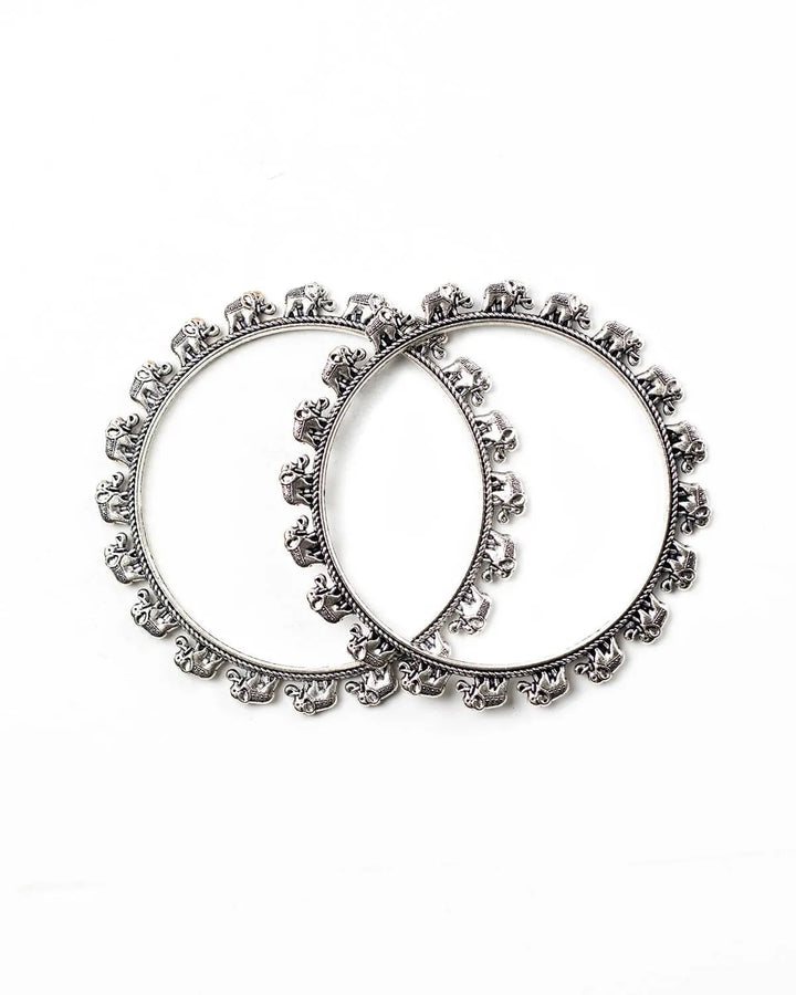 Pair of oxidised silver round bangles with decorative elephants